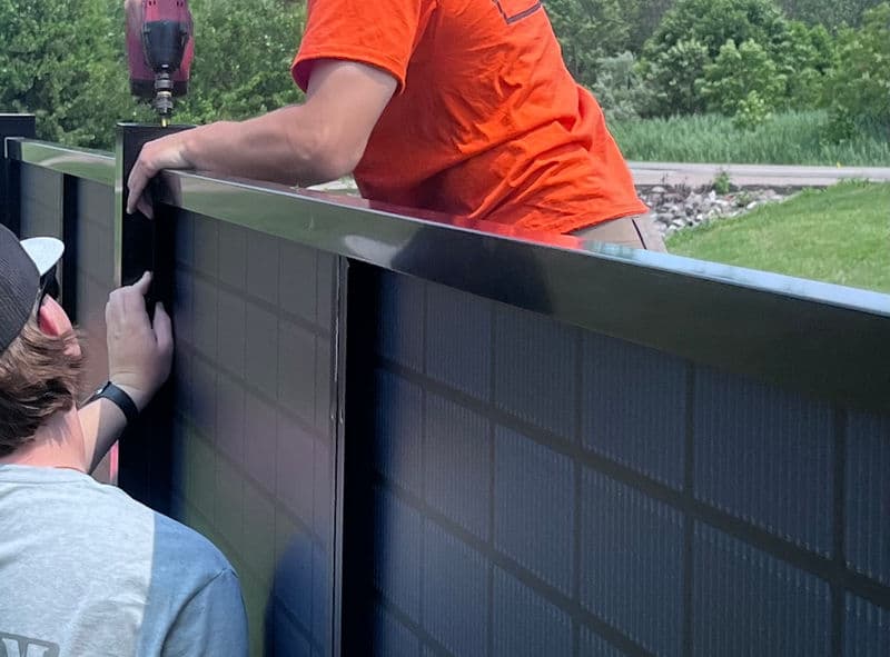 SOL Fence solar privacy fence being installed