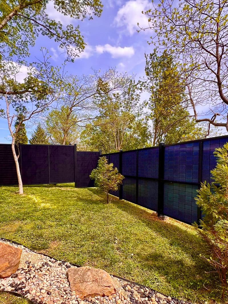 Row of SOL Fence solar privacy fence panels